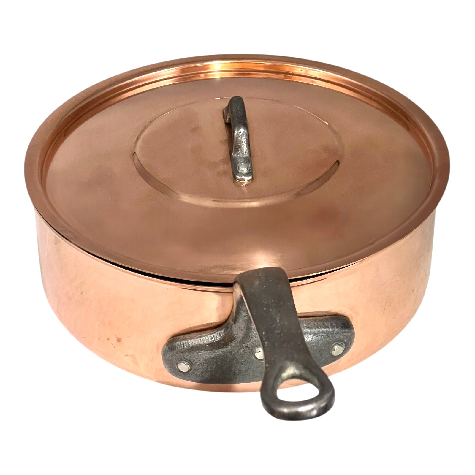 Copper pot with a lid on a white background