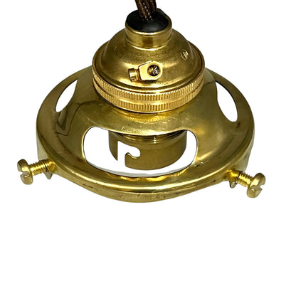 Brass ceiling light fixture on a white background