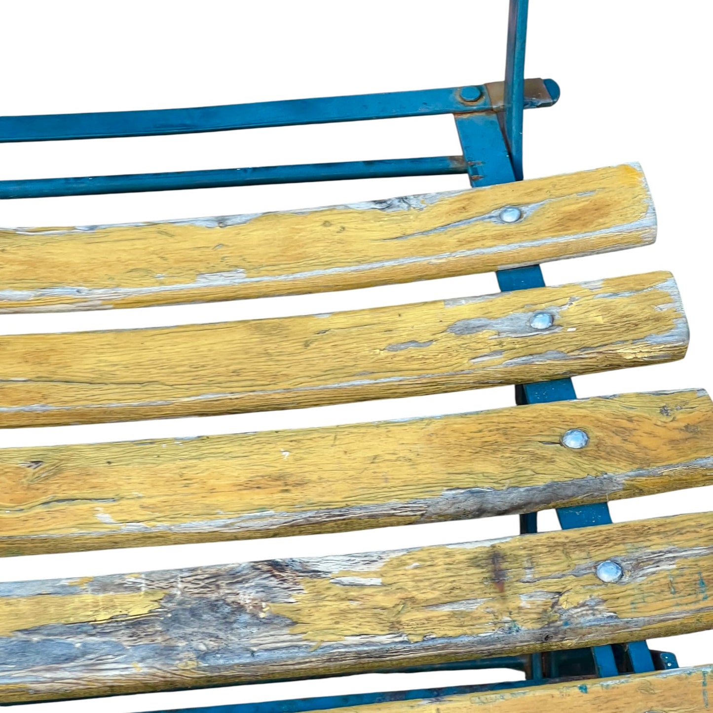 Close up of a wooden French folding chair on a white background 