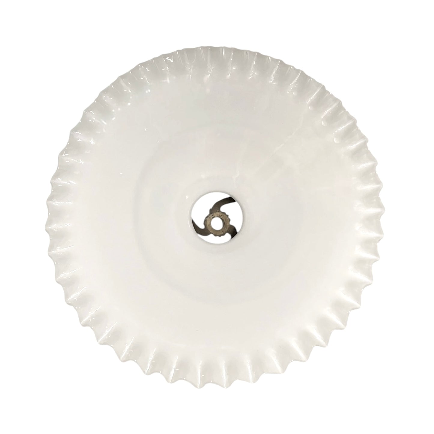 Round white object with a central metallic component on a white background