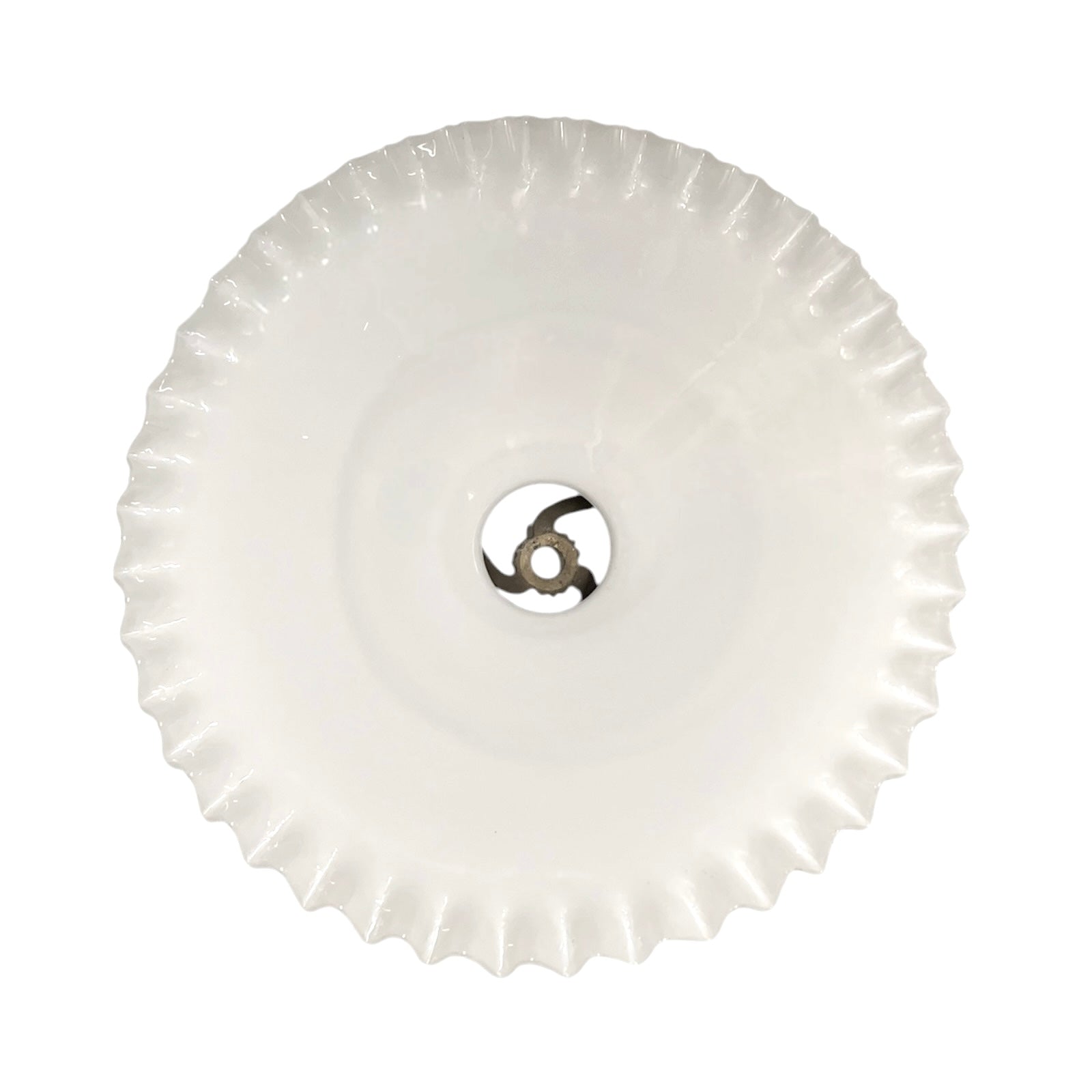 Round white object with a central metallic component on a white background