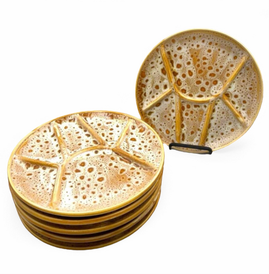 A set of 6 speckled yellow divided fondue plates, vintage in style on a white background 