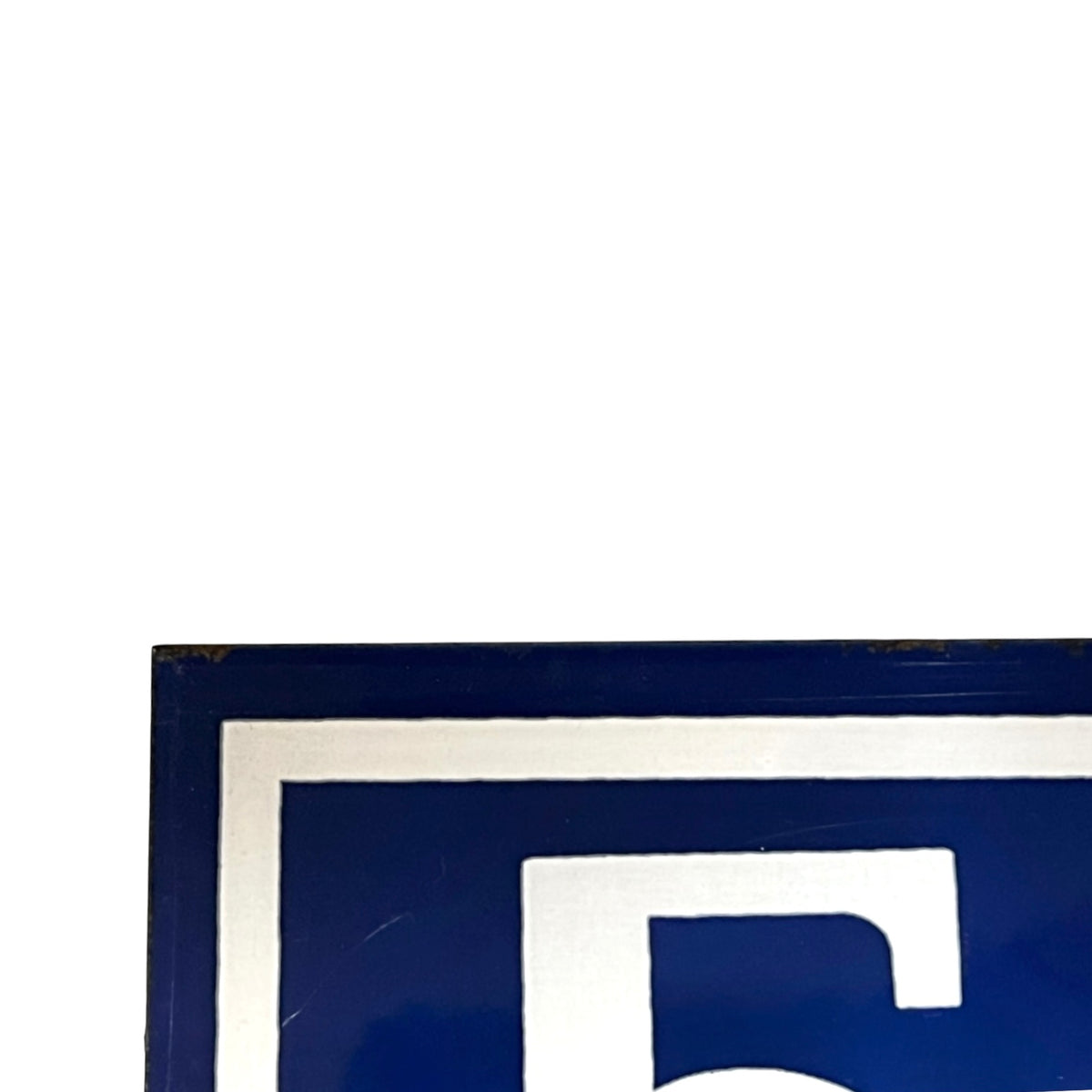 A close-up of a blue and white sign featuring a large white number 51 inside a blue square with a white border.