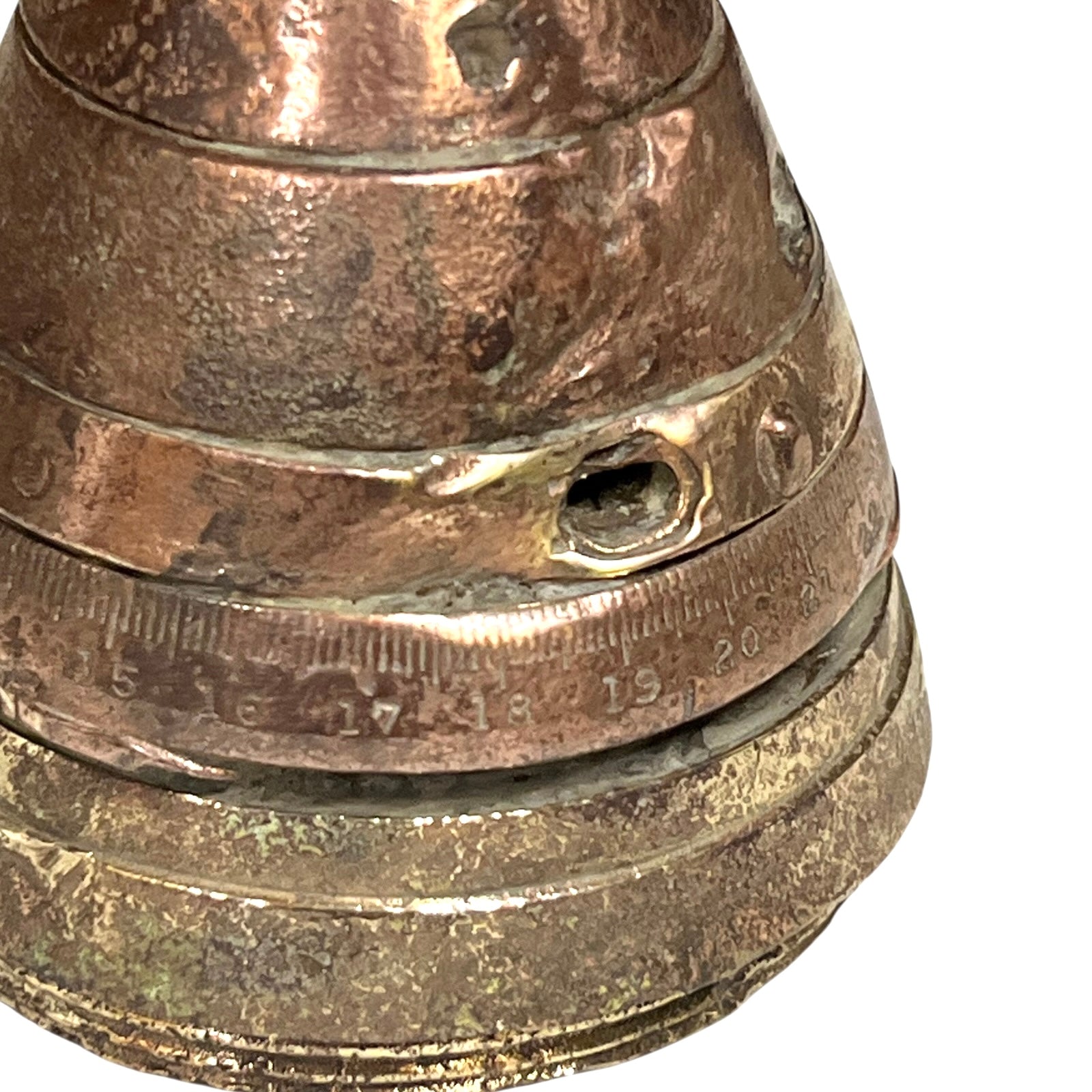 Close up of WW1 brass fuse on a white background