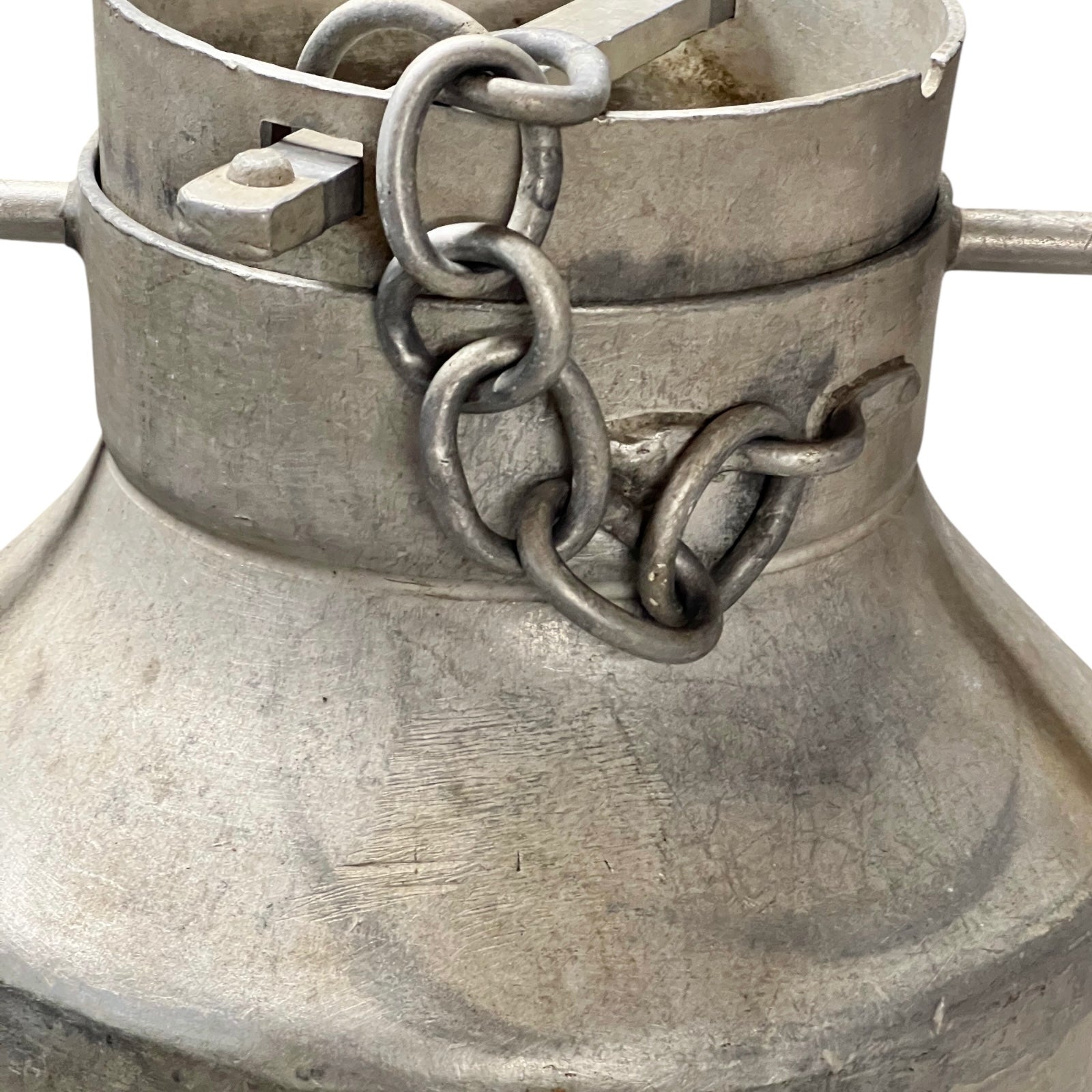 Metal French milk churn with a chain detail on a white background