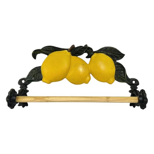 Decorative paper towel holder with lemons and leaves on a white background