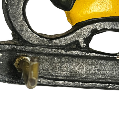 Close up of a cast iron decorative hook set 