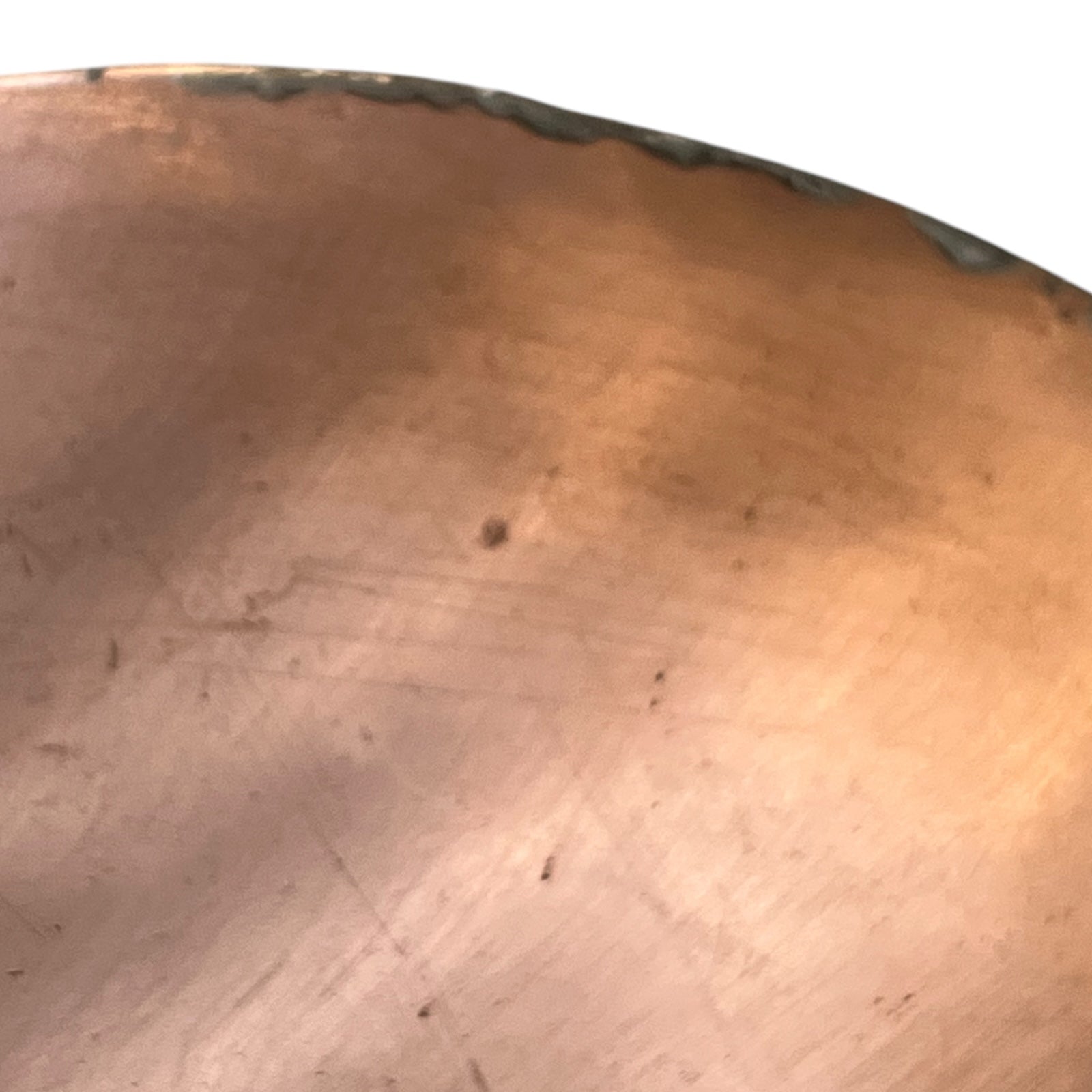 rim of copper pan lid