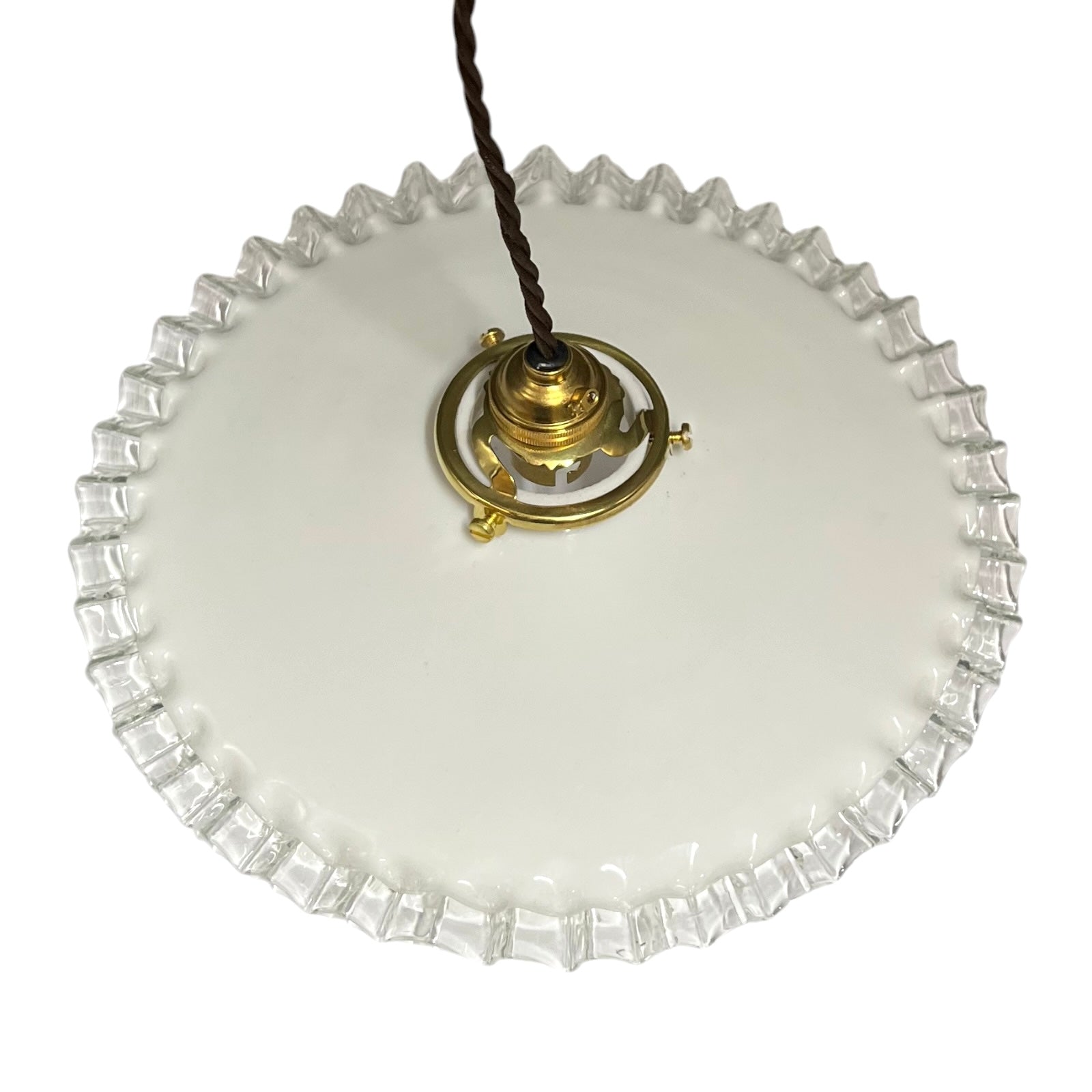 A vintage white glass ceiling light shade with a fluted, scalloped edge and a brass central fixture, suspended by a dark brown cord against a white background.