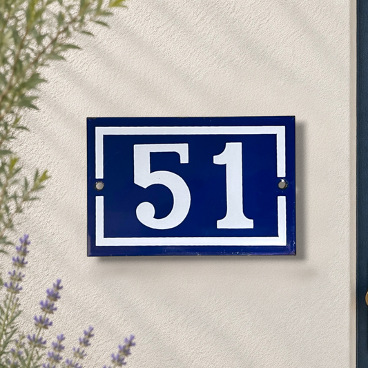 French blue and white door number 51 