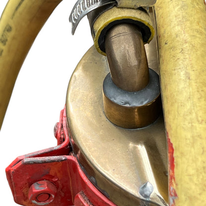 close up of a French copper garden sprayer on a white background 