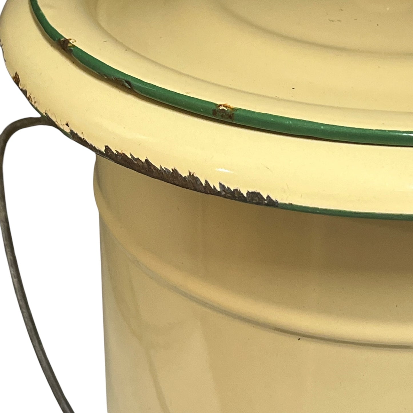 Close up of a French enamel bucket on a white background 