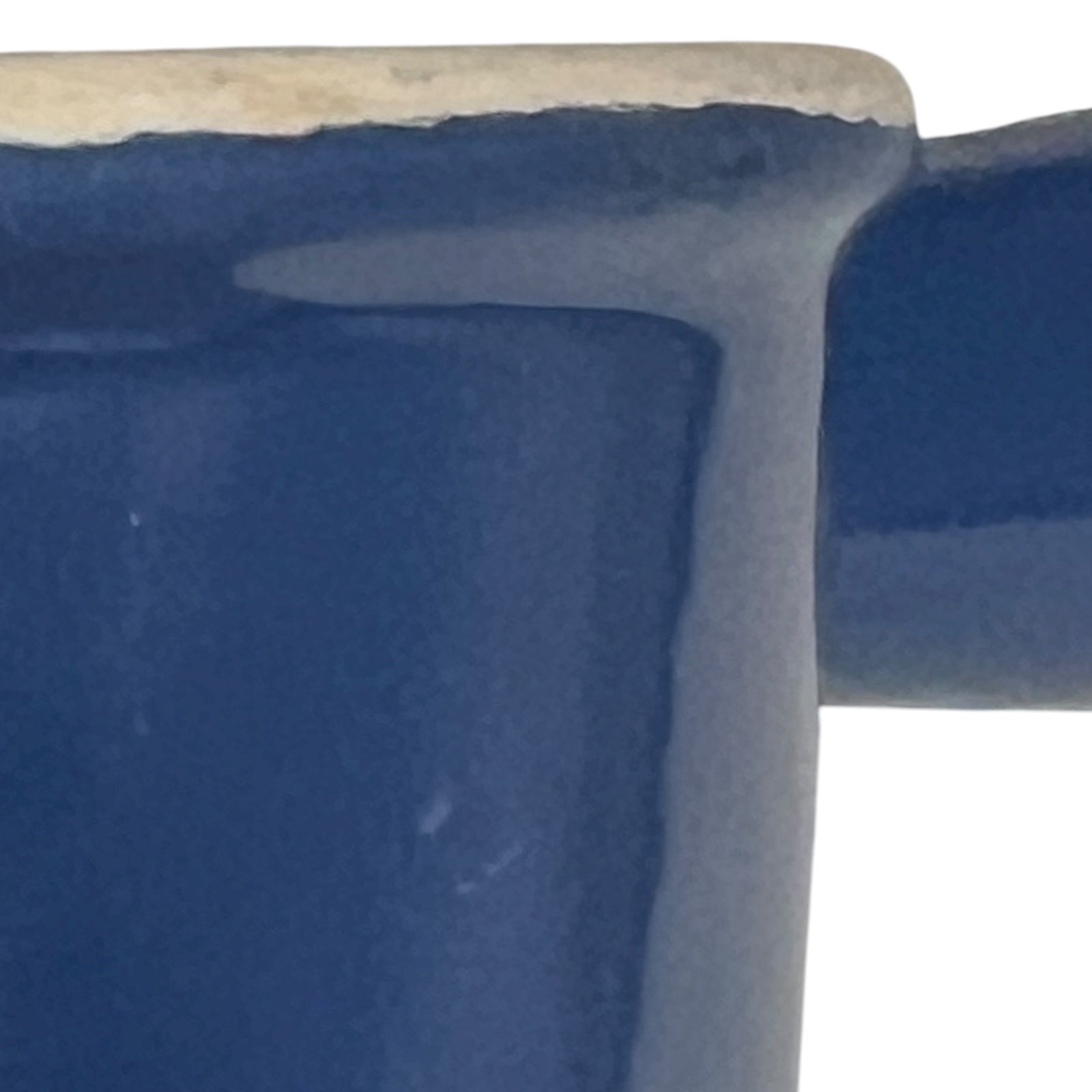 Close-up of a blue saucepan with a white background