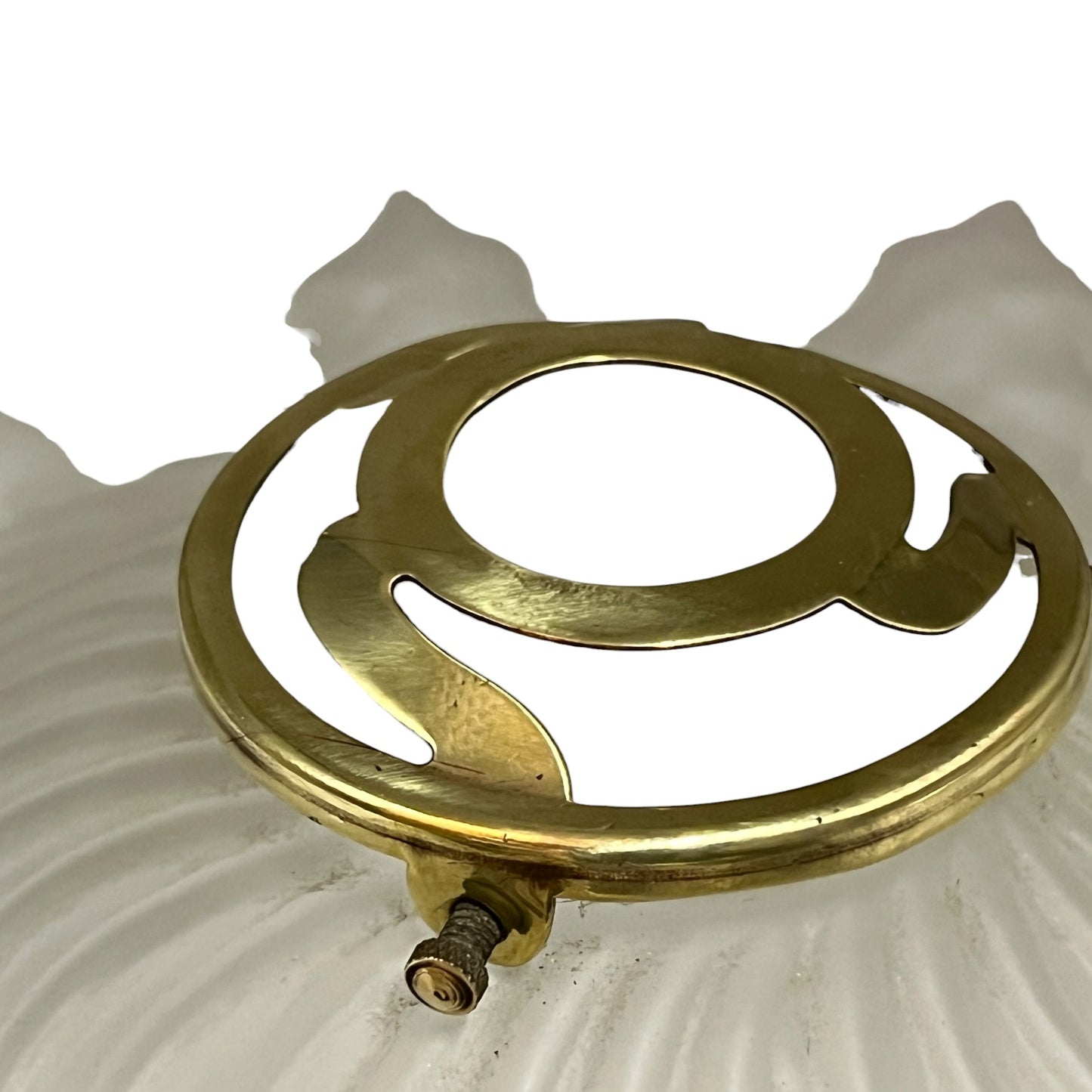Close up of a glass lampshade on a white background 