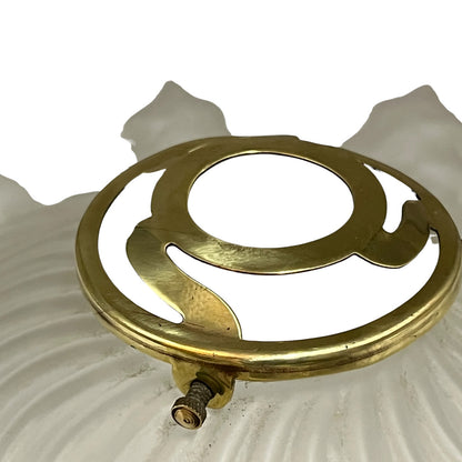 Close up of a glass lampshade on a white background 