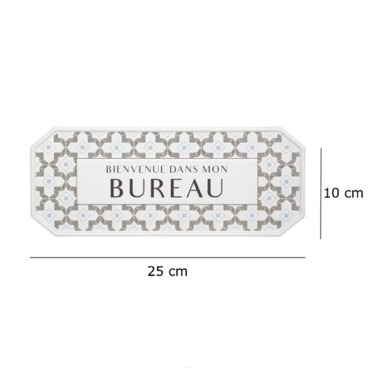 Decorative sign with floral pattern and text 'BIENVENUE DANS MON BUREAU' on a white background