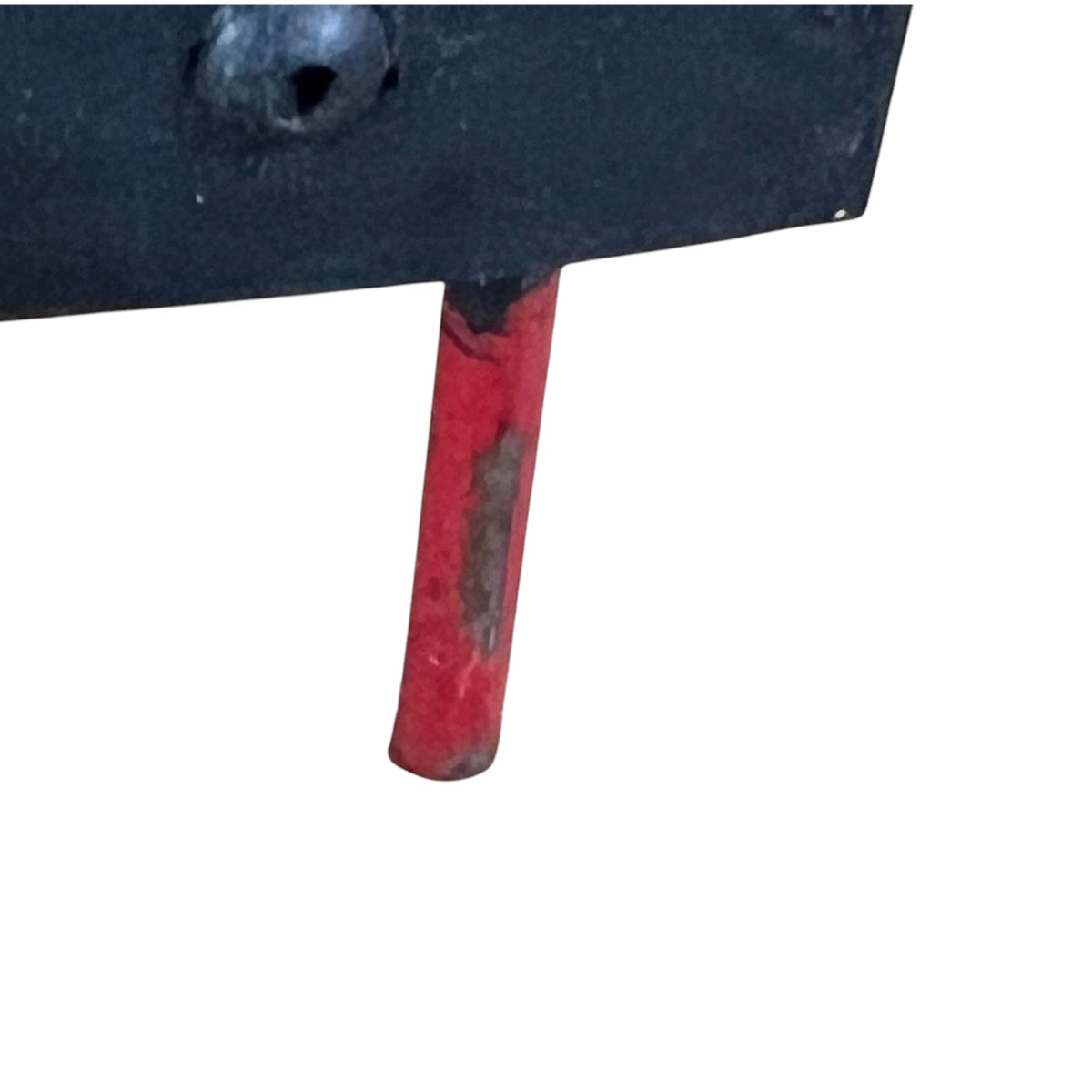 Close up of the metal foot of a French bread stand 