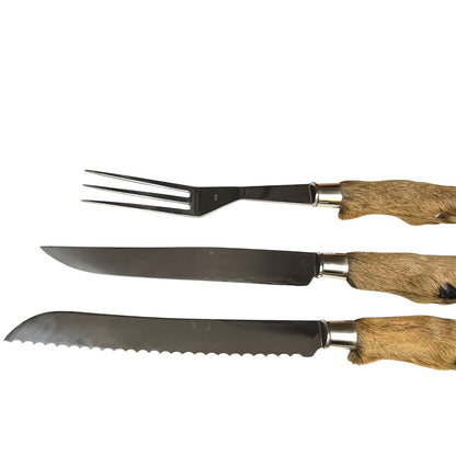 A three-piece knife set featuring a carving fork, a steak knife, and a serrated bread knife, all with dark steel blades and textured brown animal hide handles, shown against a plain white background.
