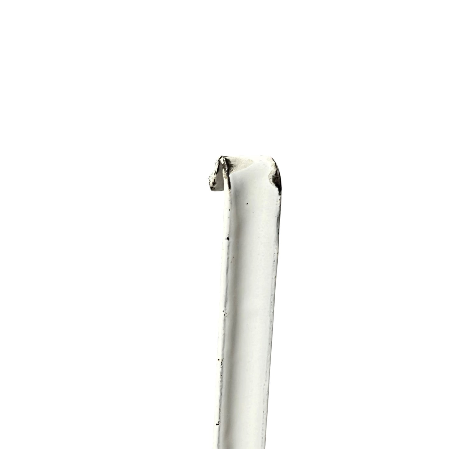 close up of a vintage kitchen utensil on a white background