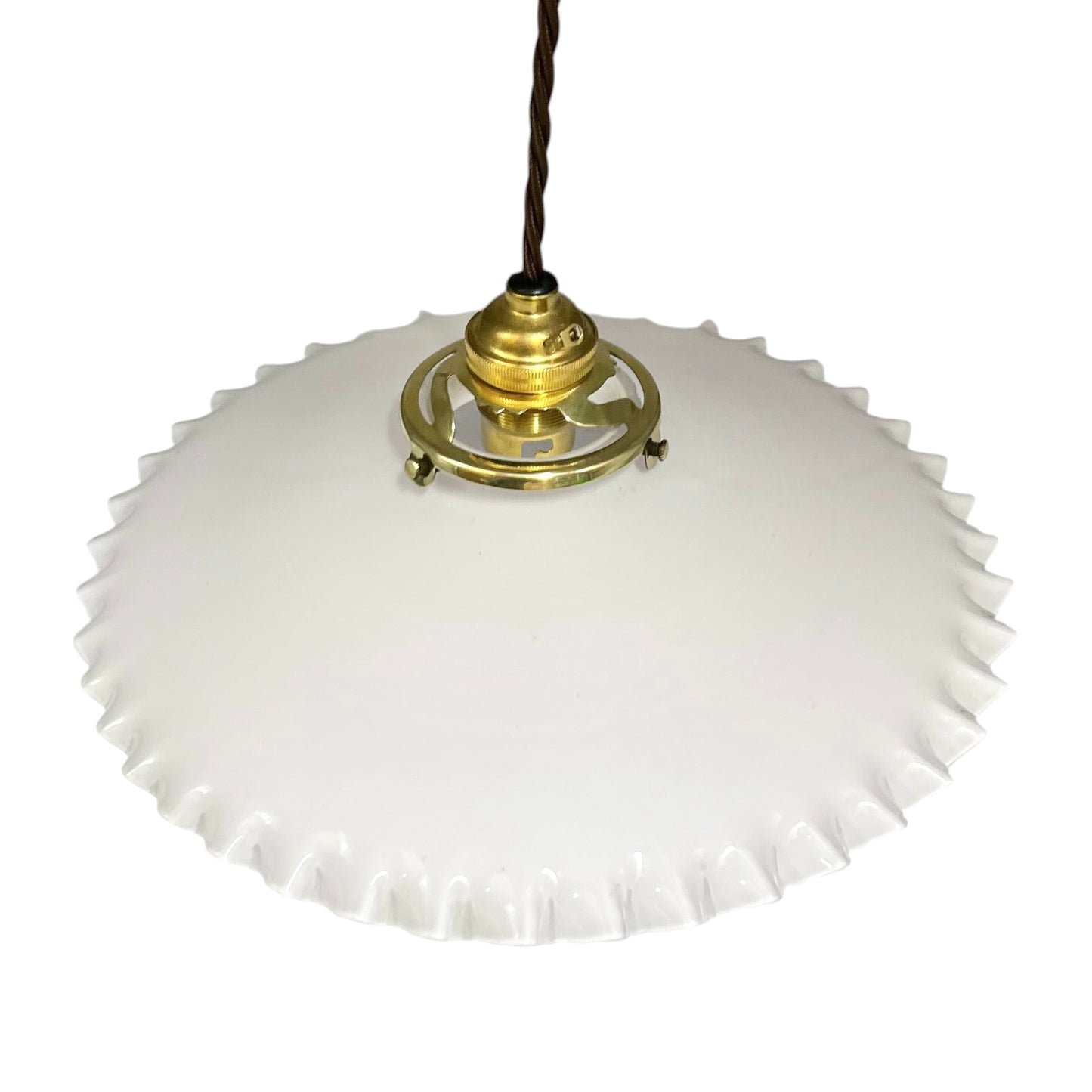 A vintage-style pendant light with a white, scalloped-edge glass shade and a brass metal fixture, suspended by a dark brown cord against a plain white background.