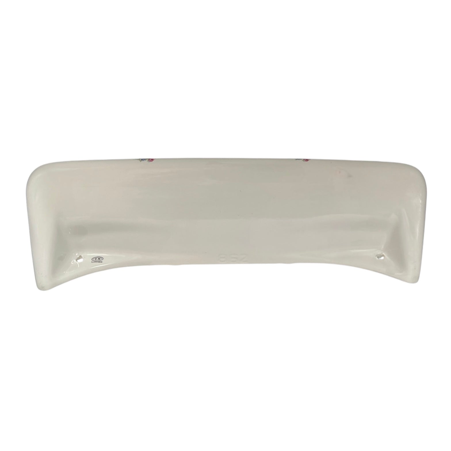 A curved, off-white ceramic underside of a shelf, shown against a plain white background