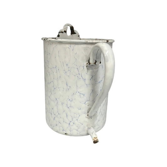 White and blue enamelled garden planter with marbled pattern on a white background