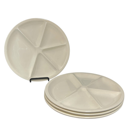 Set of beige Le Creuset divided fondue plates  on a white background