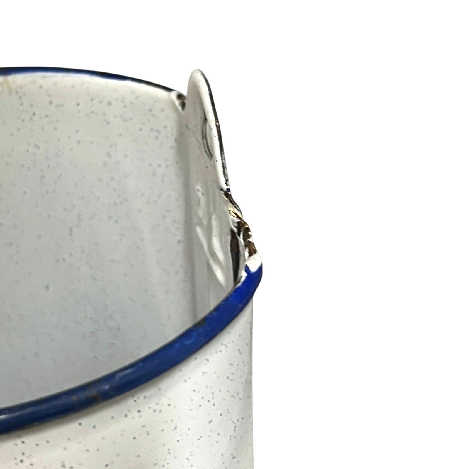 Close-up of a enamel planter with speckled pattern on a white background