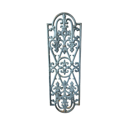 close up of a metal decorative wall planter on a white background