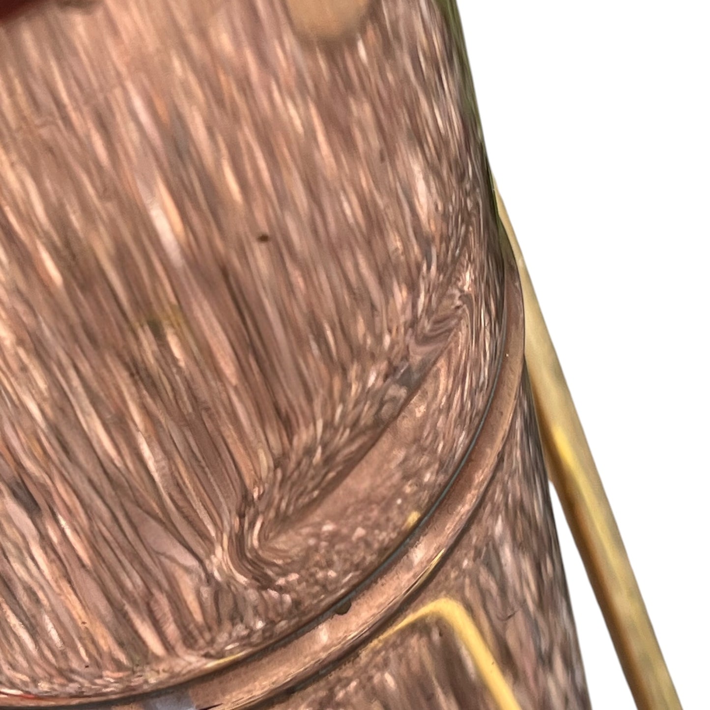 close up of a French copper garden sprayer on a white background 