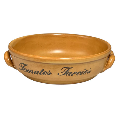 Ceramic dish with handles and 'Tomates Farcies' text on a white background