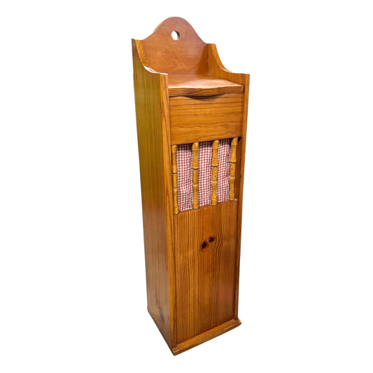 A vintage wooden French baguette box with a warm honey-toned finish, featuring a top shelf, a drawer, a lower door, and a pink-and-white gingham check patterned panel on the front