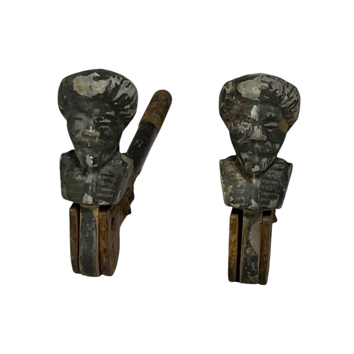 Close up of vintage male head shutter dogs 