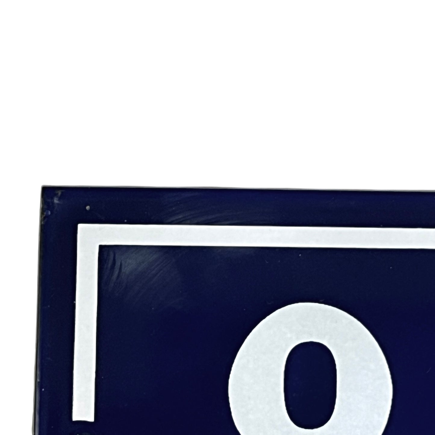 close up of a French vintage blue and white door number 88 on a white background 