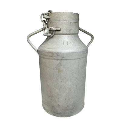 A French vintage aluminum milk churn, perfect for use as a charming garden planter or creatively upcycled into a seat, complete with a lid, set against a white background.