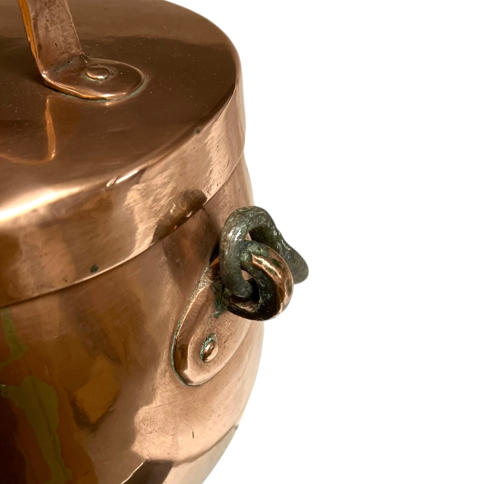 Close up of a copper cooking pot stockpot with handles on a white background