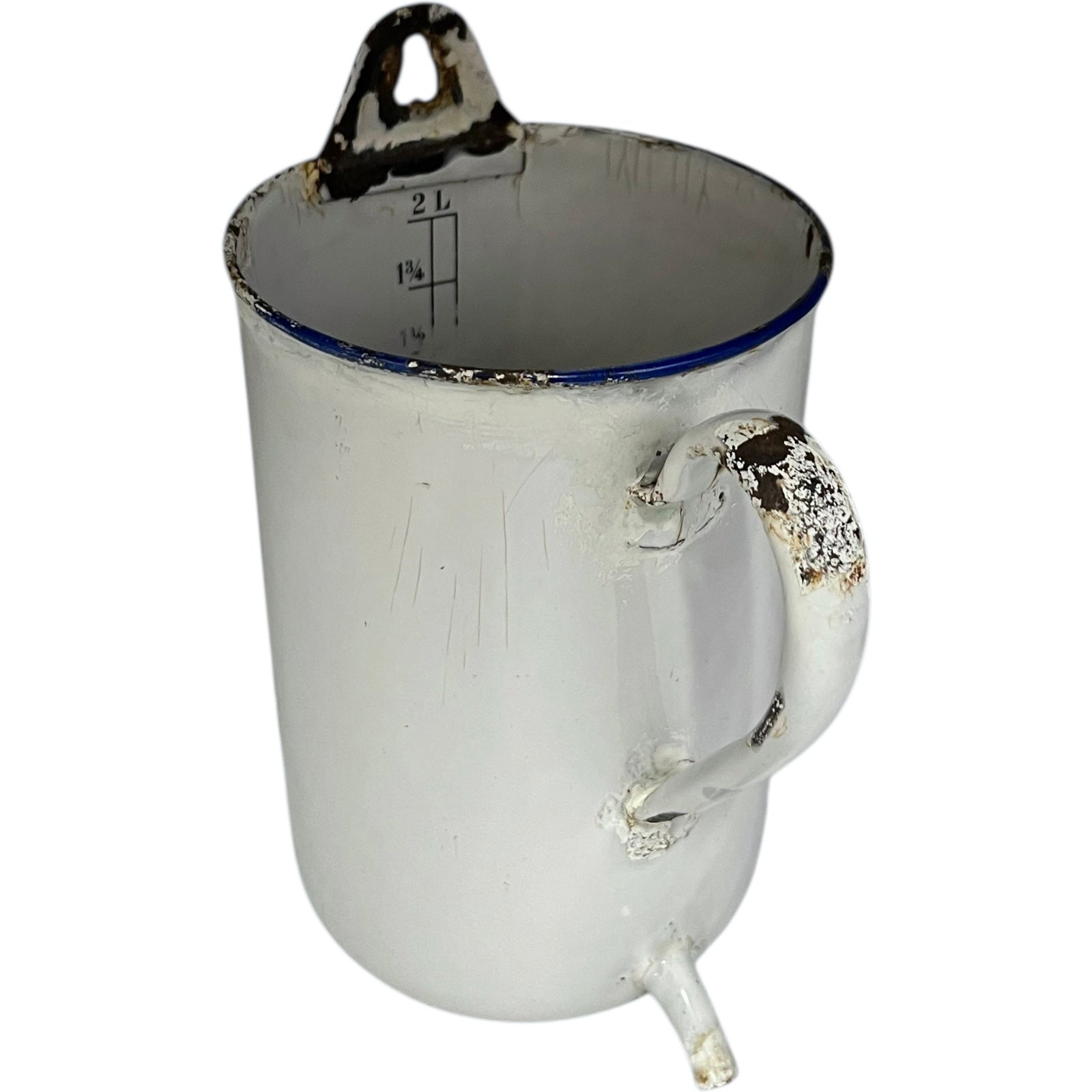 French vintage enamel irrigator in white with a blue trim in a well worn condition for sale from All Things French Store