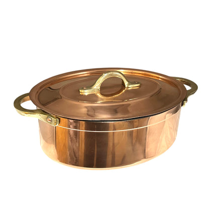 Copper pot with lid on a white background