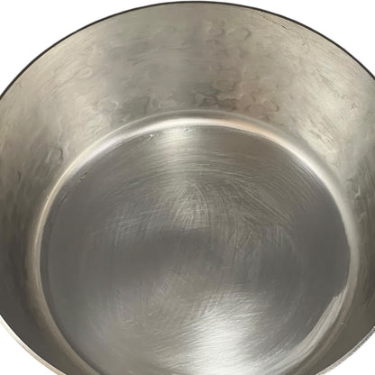 close up image of copper pan inside