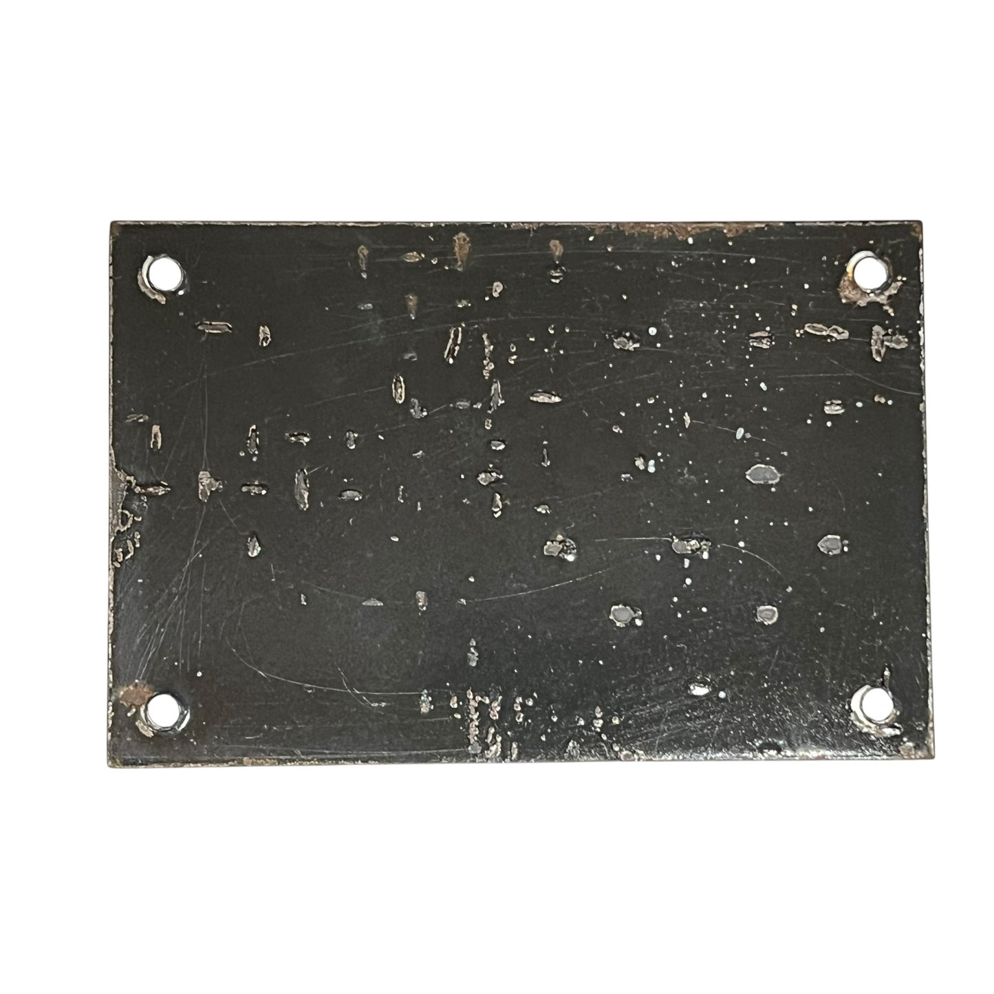 Rectangular metal plate with holes on a white background