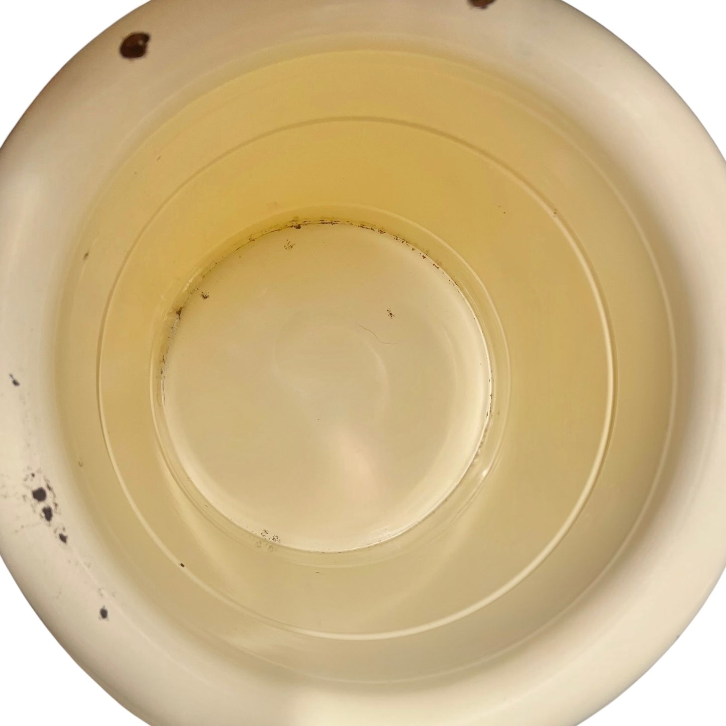 Close up of a French enamel bucket on a white background 