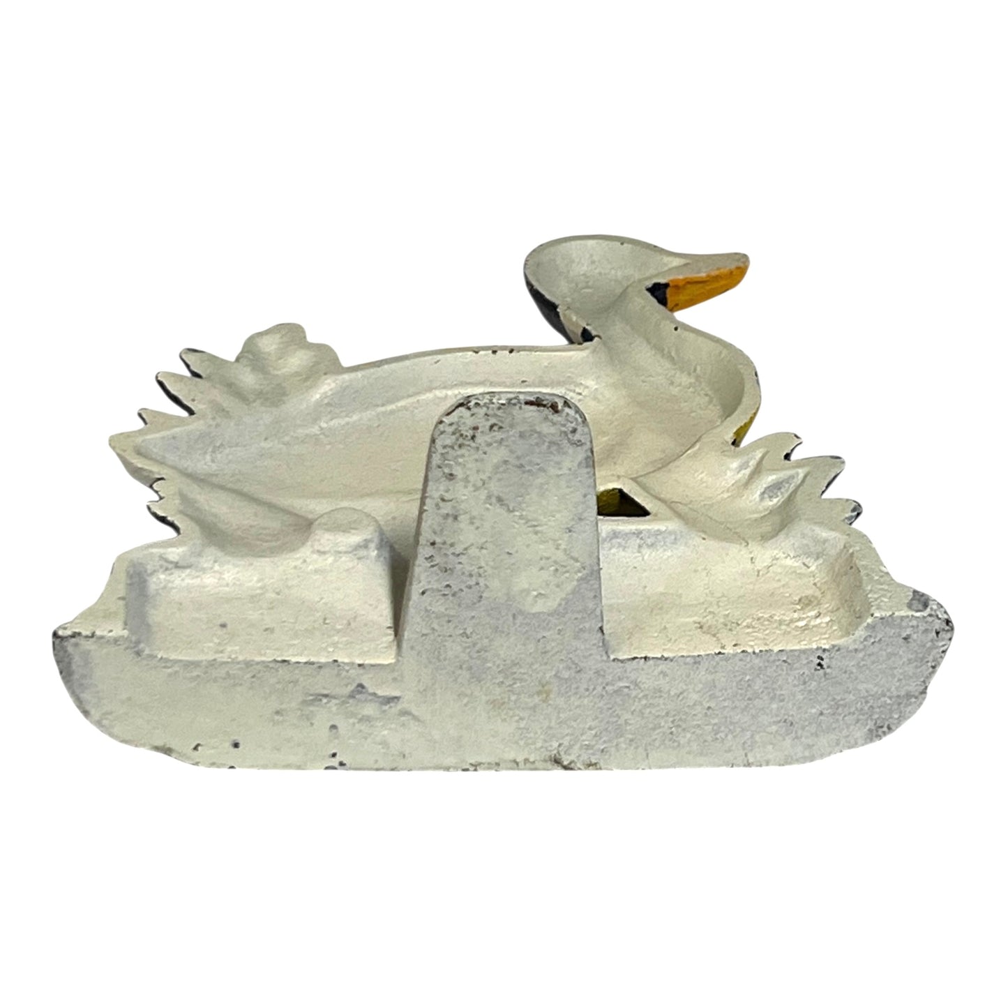 Close up of cast iron doorstop on a white background