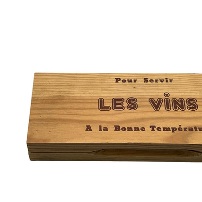 Wooden wine cooler box with engraved text on a white background
