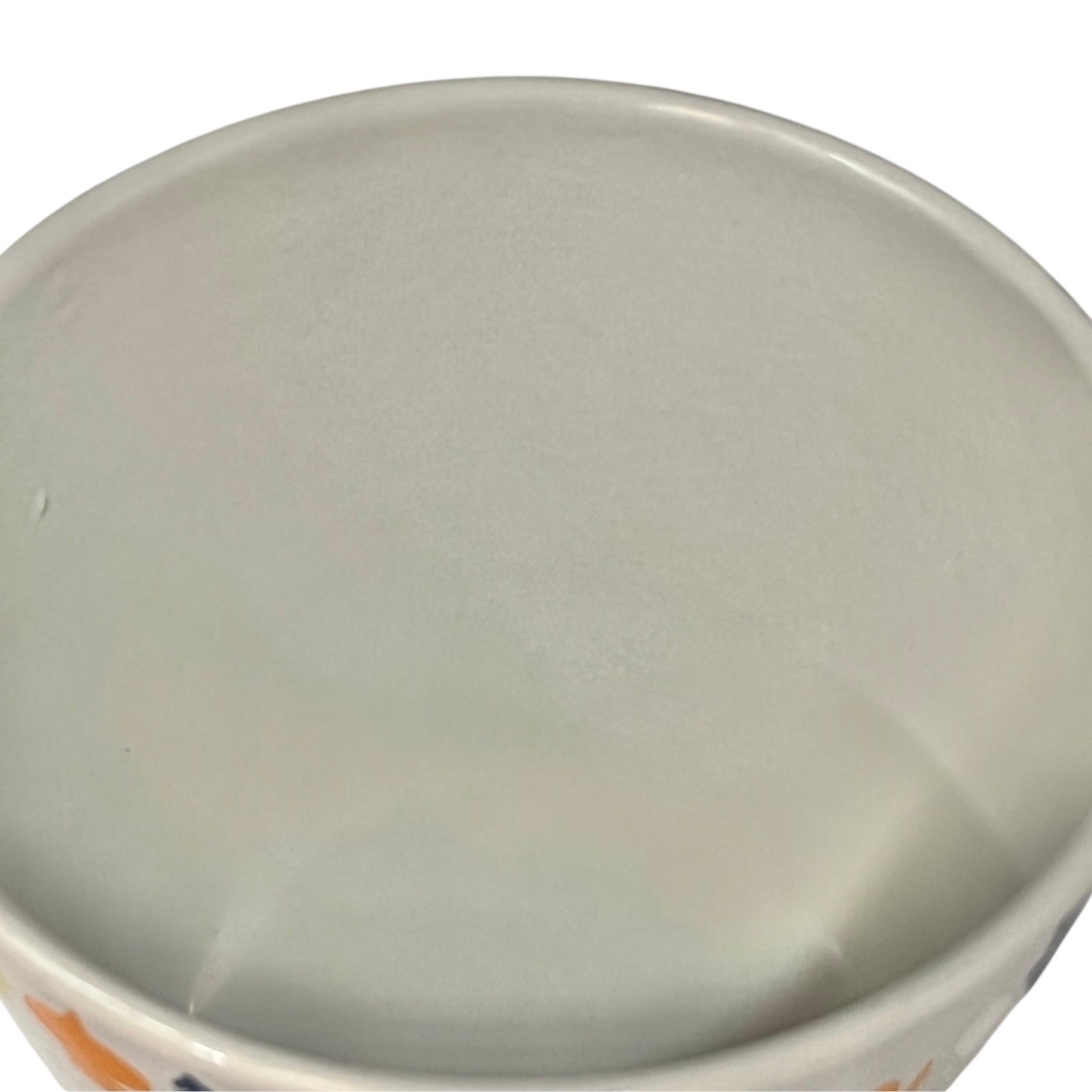 Close-up of a Le Creuset with a plain background
