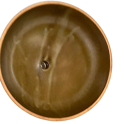Round brown ceramic dome on a white background
