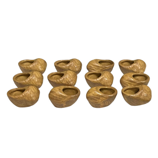 Set of 12 small snail cups with a textured, organic shape, arranged in three rows of four on a plain white background.