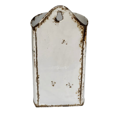 A distressed white enamel wall hook with a rustic brown rust finish, shown against a plain white background.