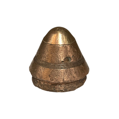 A small militaria WW1 brass fuse paperweight with a textured finish on a white background 