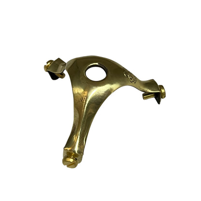 Brass gallery for holding a pendant lamp shade  on a white background