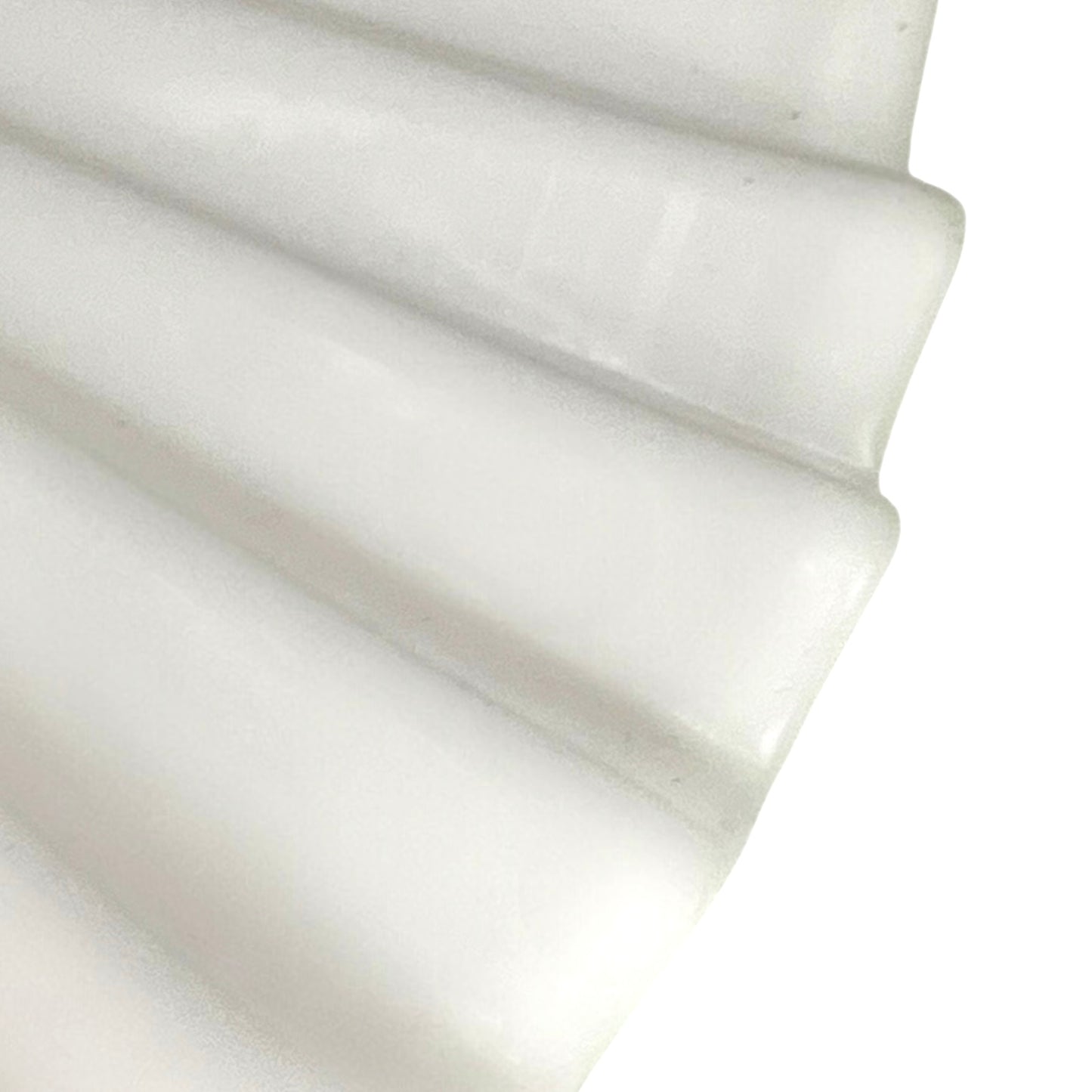 Close up of French glass lampshade on a white background
